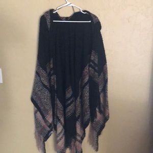 Black hooded poncho